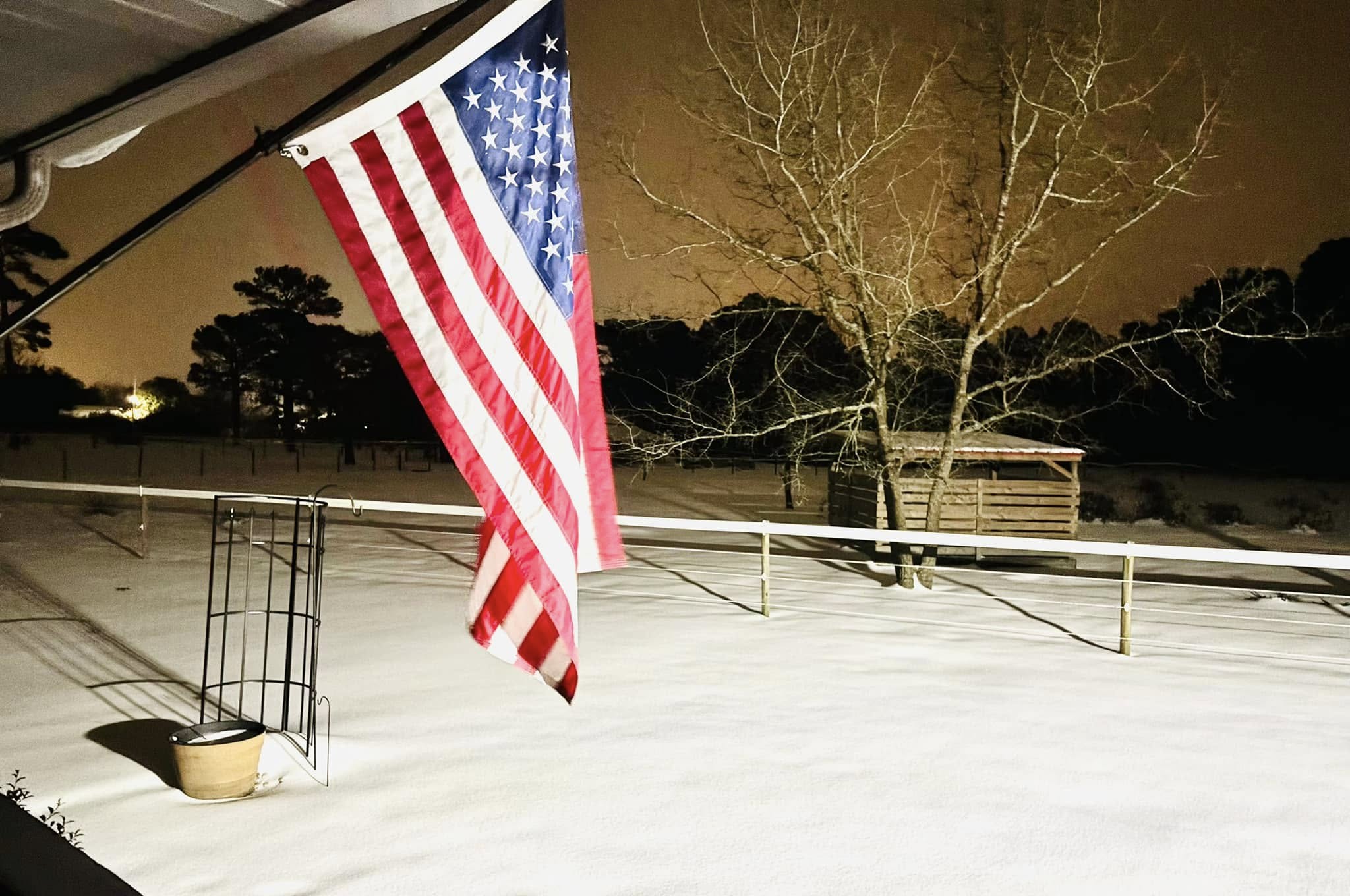 American flag in winter scene